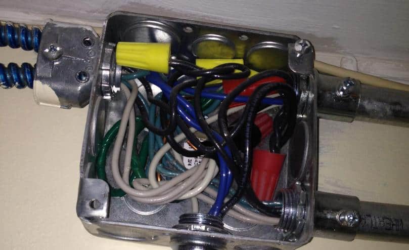 Can a junction box be covered by insulation?