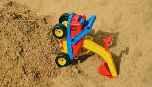 A tipped toy excavator