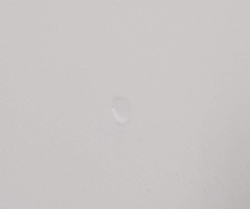 A nail pop on drywall