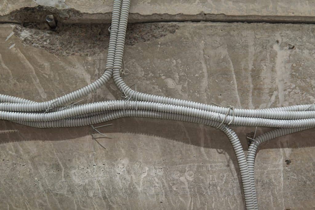 A various electrical conduit installed outside
