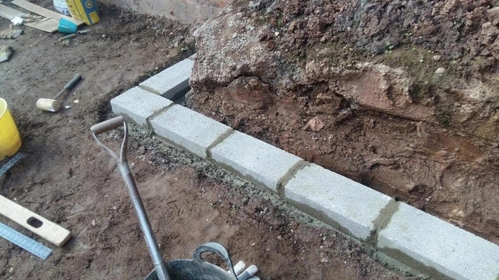 9 laying the first course of breeze blocks