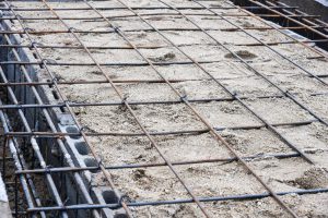 Thinner wire mesh used in concrete footings for a foundation