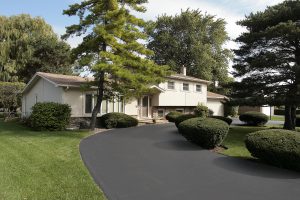 Home in suburbs with circular driveway