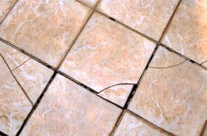 A few cracked tiles after tenting issues underneath