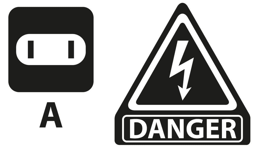An old two prong two wire outlet with a danger sign